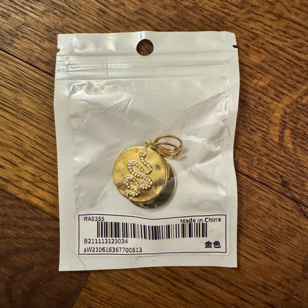 324 Shein Gold Snake Earrings 10$